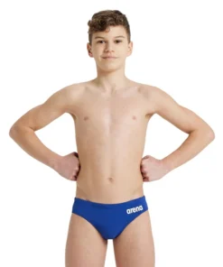 Bañador slip liso arena Performance para niño Team – Royal/Blanco
