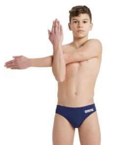 Bañador slip liso arena Performance para niño Team – Marino/Blanco