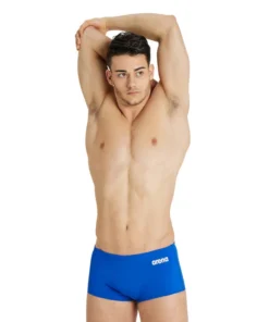 Bañador corto liso de tiro bajo arena Performance para hombre Team – Royal/Blanco