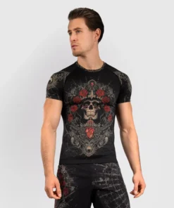 Rashguard à Manches Courtes Venum Santa Muerte 5.0 – Noir Profond/Or