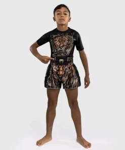Short Muay Thai Venum enfant Tiger – Noir/Orange Néon